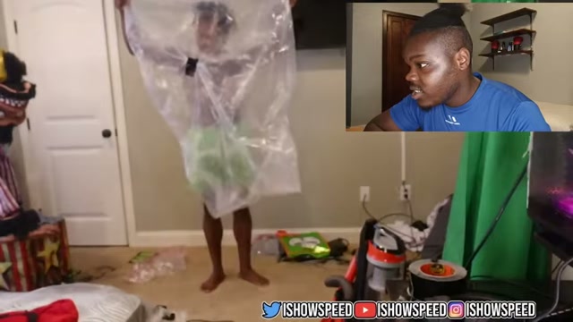 IShowSpeed during the vacuum-trash-bag challenge livestream, a clip fans cite when comparing parent interruptions of early streaming careers